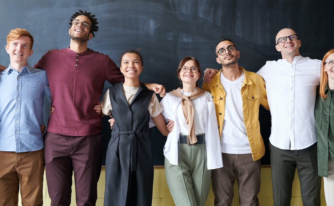 employees posing for a photo